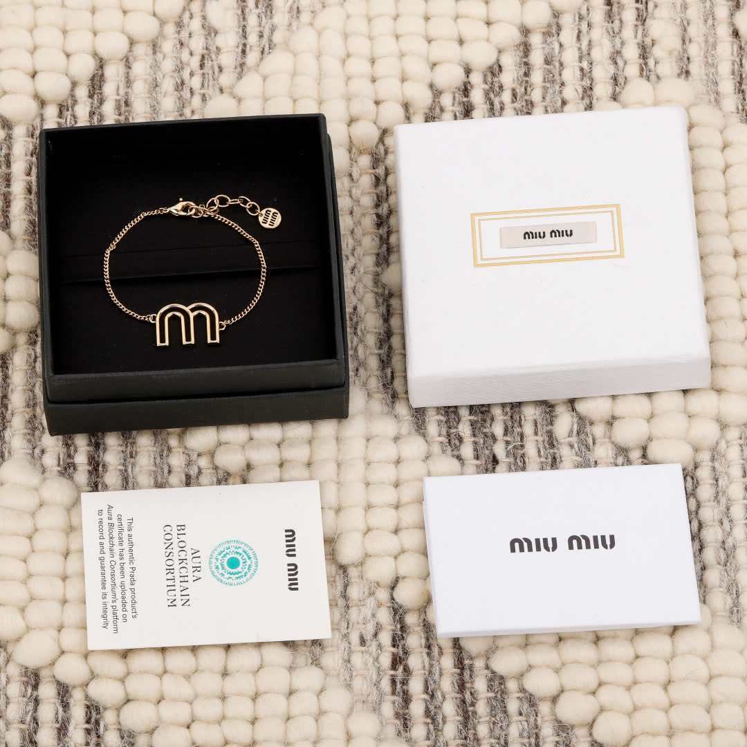 Miu Miu Gold Tone 'M' Logo Bracelet Miu Miu Gold Tone 'M' Logo Bracelet